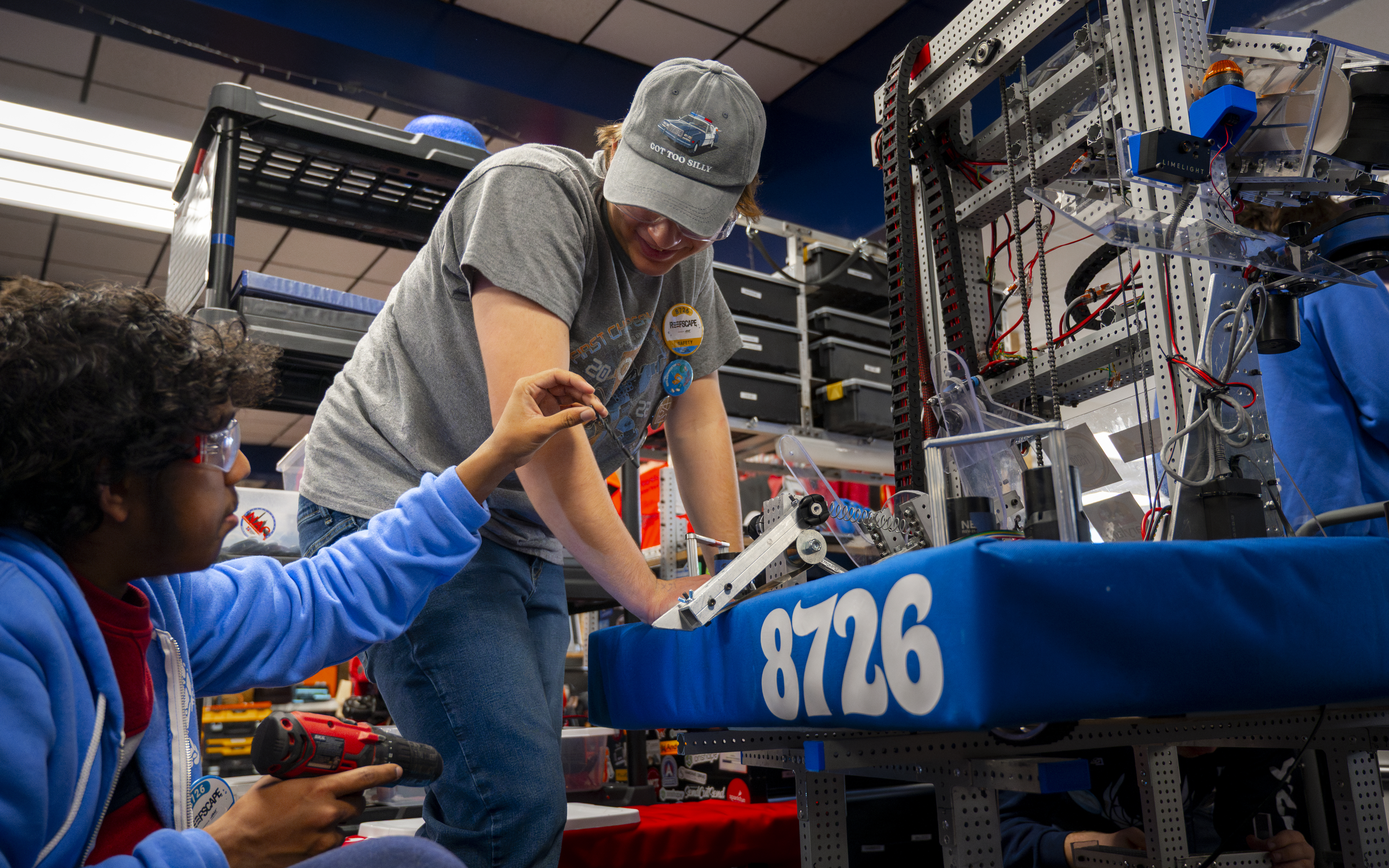 CryptoHawks mechanical sub-team working on the robot